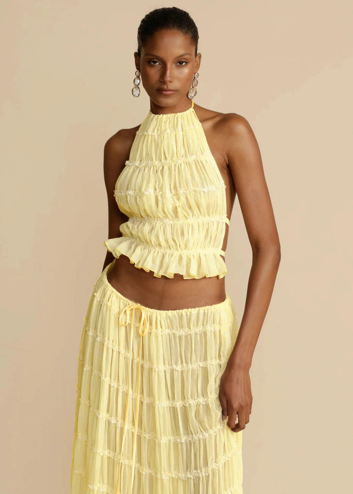 Chic Halter Crop Top and Pleated Maxi Skirt