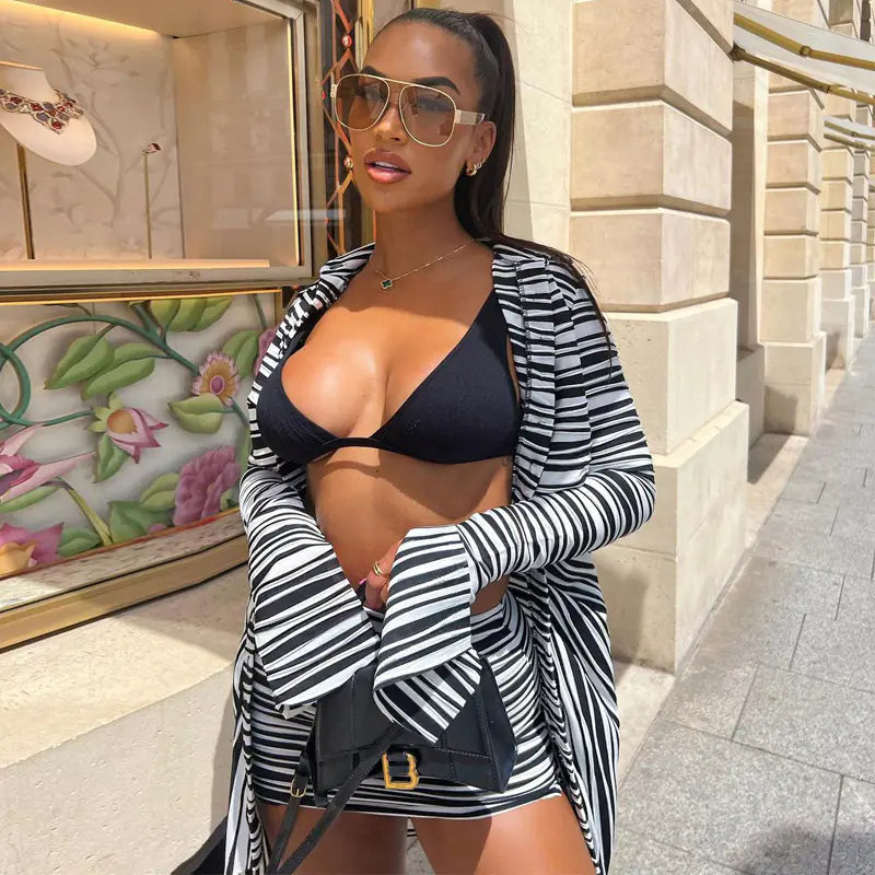 Chic Zebra Print Cardigan and Mini Skirt Set